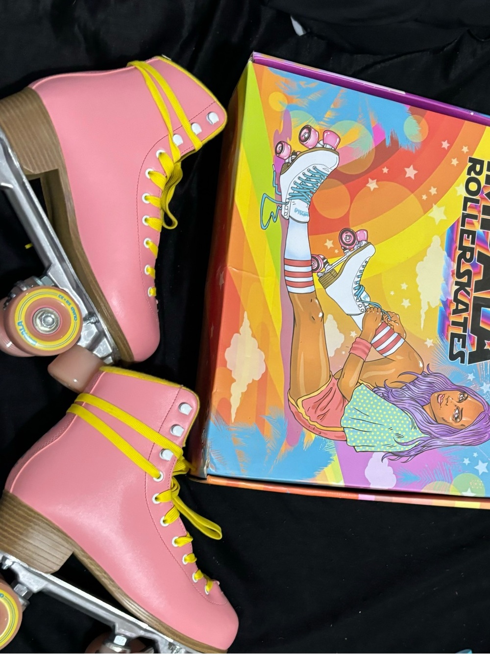 Retro Pink Roller Skates with Yellow Accents